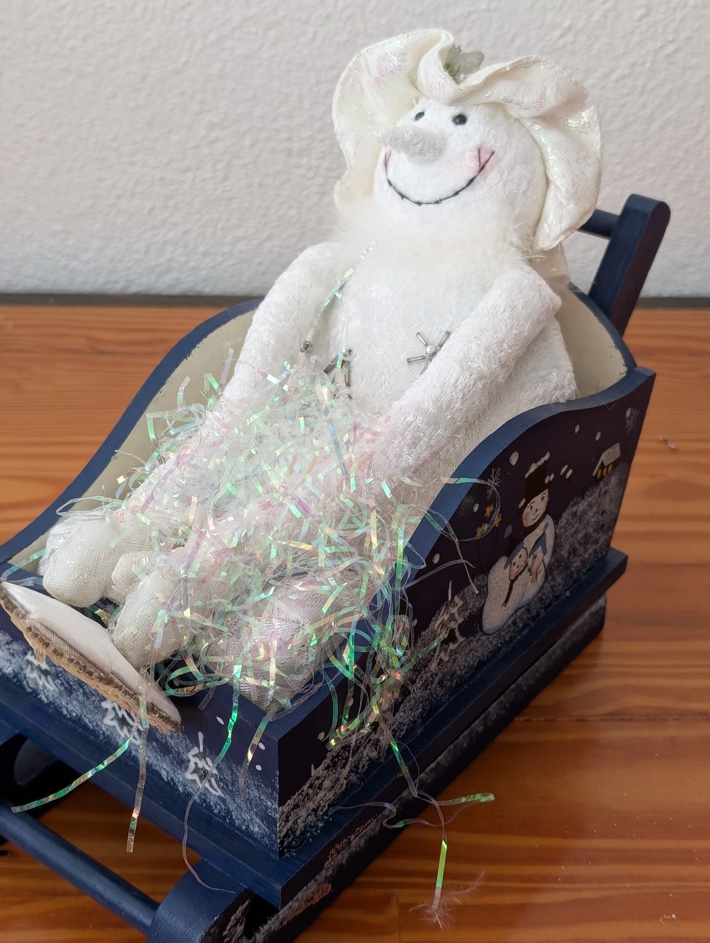 Snowman in Sleigh from Unknown - Holiday Decor (Fabric, Wood, Tinsel Figurine / Centerpiece, Whimsical, Winter Wonderland, White, Blue, Iridescent)