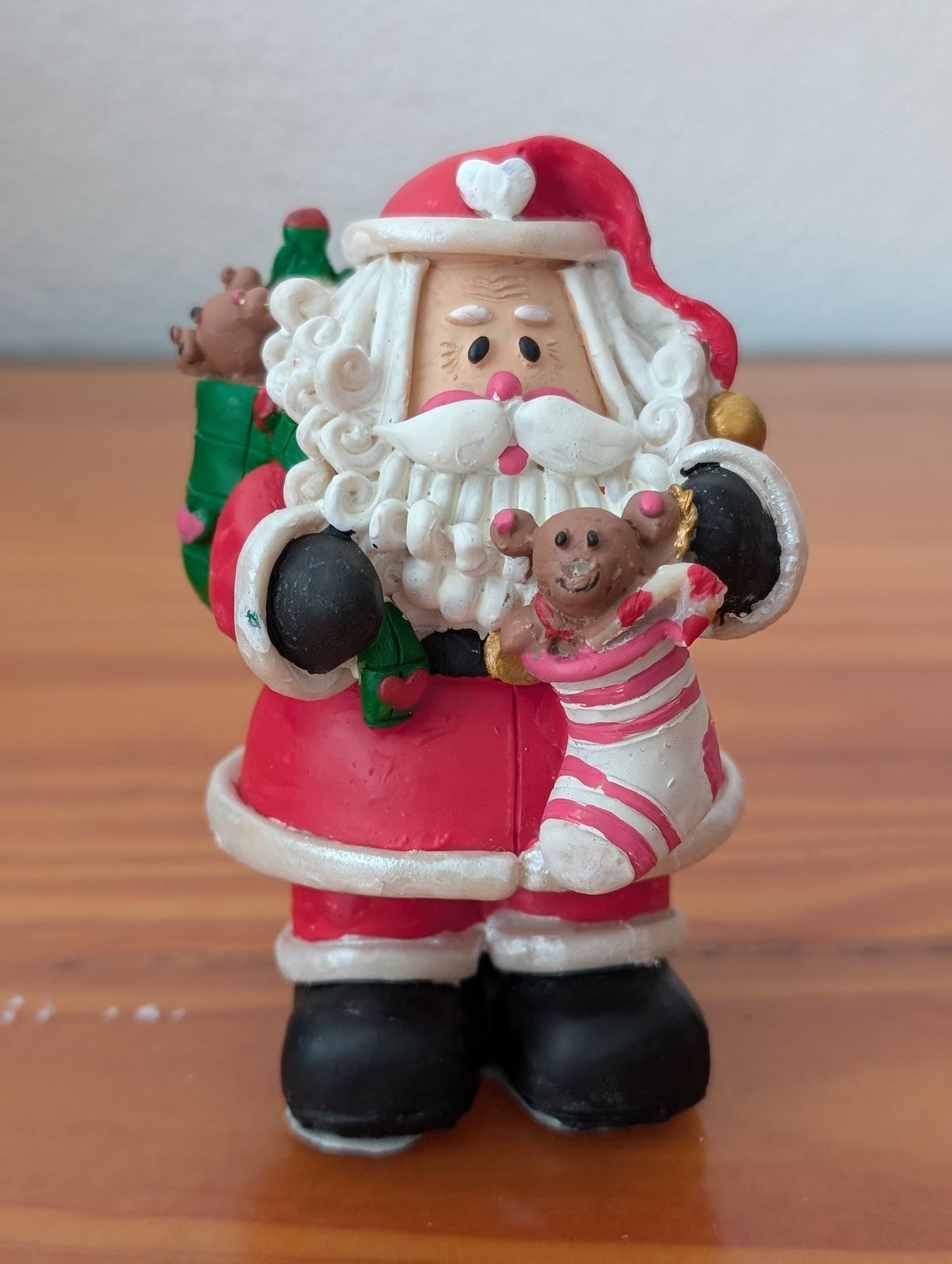 Santa with Toys Figurine from Unknown - Holiday Decor (Resin Figurine, Traditional, Collectible, Red, White, Black)