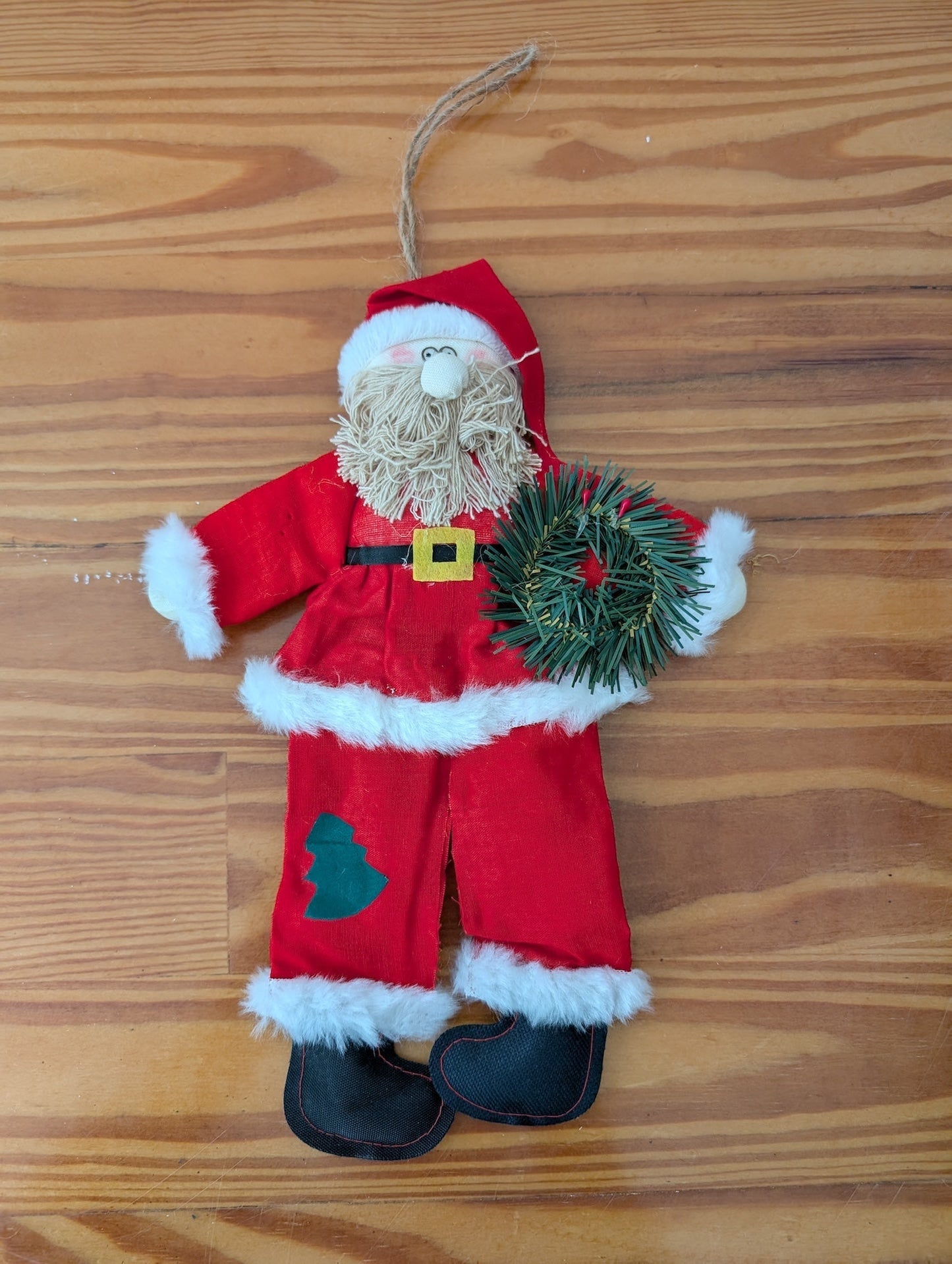 Plush Santa with Wreath from Unknown -  Holiday Decor (Fabric, Faux Fur, Plastic, String Ornament, Handmade, Craft, Traditional, Red, White, Green)